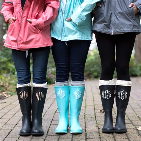 monogrammed rain jacket and boots.